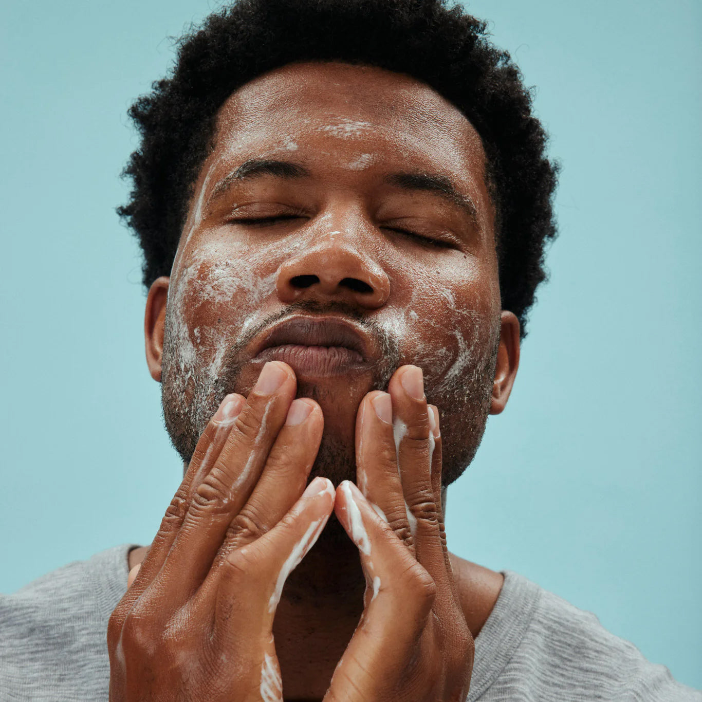 Man using American Boxer's Supreme Anti-Aging 4-Step System